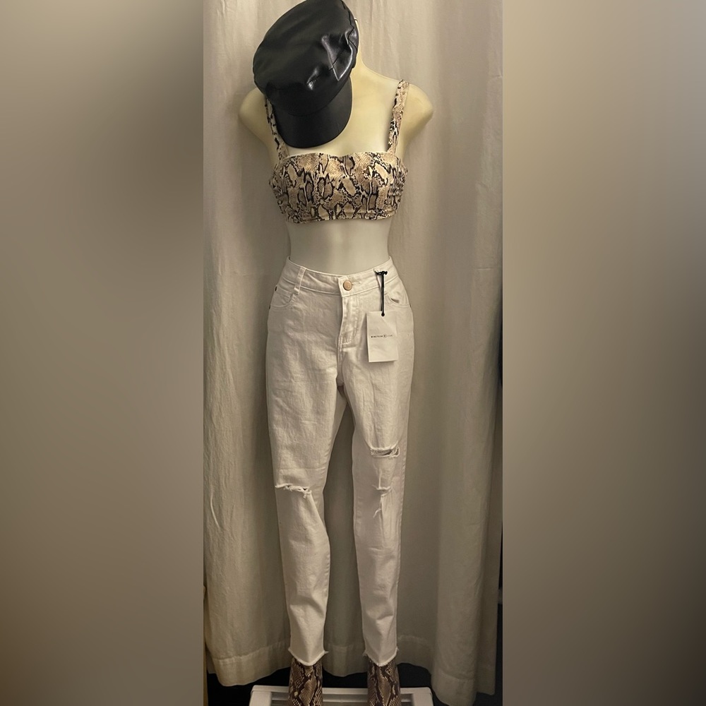 THE RIPPED SKINNY JEANS